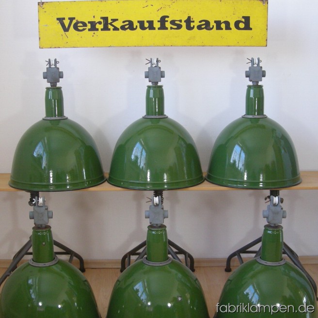 Green industrial lamps. Material: green enameled sheet and casted iron, with safety grid (all of the lamps have safety grids with screws). The lamps are cleaned and newly electrified, with E40 sockets – adapters for E27 are inclusive, so the lamps can be used with E27 bulbs. Total height: ca. 55 cm (21,6 inches, with safety grid 63 cm, 24,8 inches). Diameter of the shade ca. 46 cm (18,1 inches).
6 pieces available