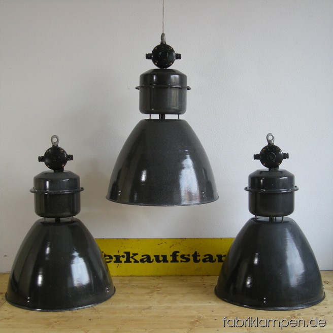 Huge industrial lamps. Material: black (grayish) enameled sheet, aluminium. The lamps are cleaned, and newly electrified, with E40 sockets - adapters for E27 are inclusive, so the lamps can be used with E27 bulbs. Total height: ca. 76 cm (30 inches). Diameter of the shade ca. 53 cm (21 inches).