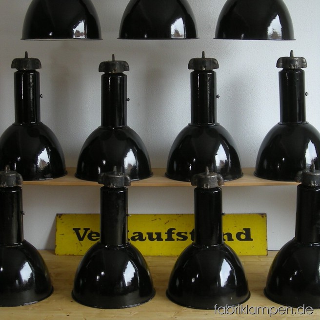 43 p. industrial lamps. Material: black enameled sheet and casted iron. The lamps are cleaned, and newly electrified, with E40 sockets - adapters for E27 are inclusive, so the lamps can be used with E27 bulbs. All the lamps have ca 2 m electric wire. Total height: ca. 53,5 cm (21,1 inches). Diameter of the shade ca. 35 cm (13,8 inches).