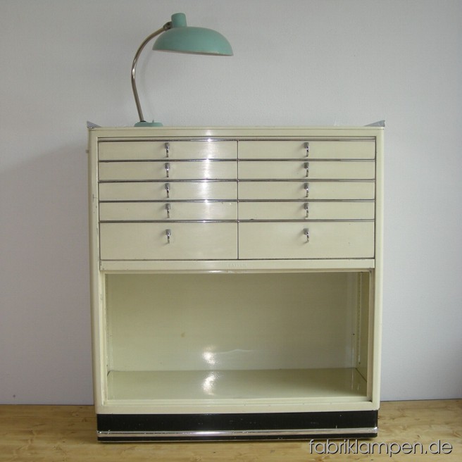 Old Baisch medical chest of drawers. The doors are missing. 
Width ca. 98 cm (38 inches), height ca. 109,5 cm (43 inches).