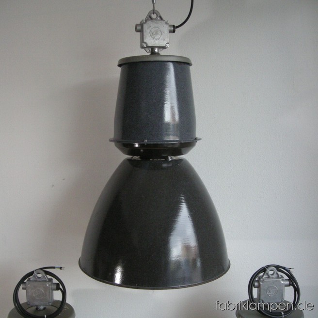 Gray industrial lamps with enameled shades. Material: gray enameled sheet, aluminium head. Newly electrified, with E40/E27 sockets. Height of the lamps ca. 84 cm (33 inches), diameter of the shades ca. 53 cm (21 inches).