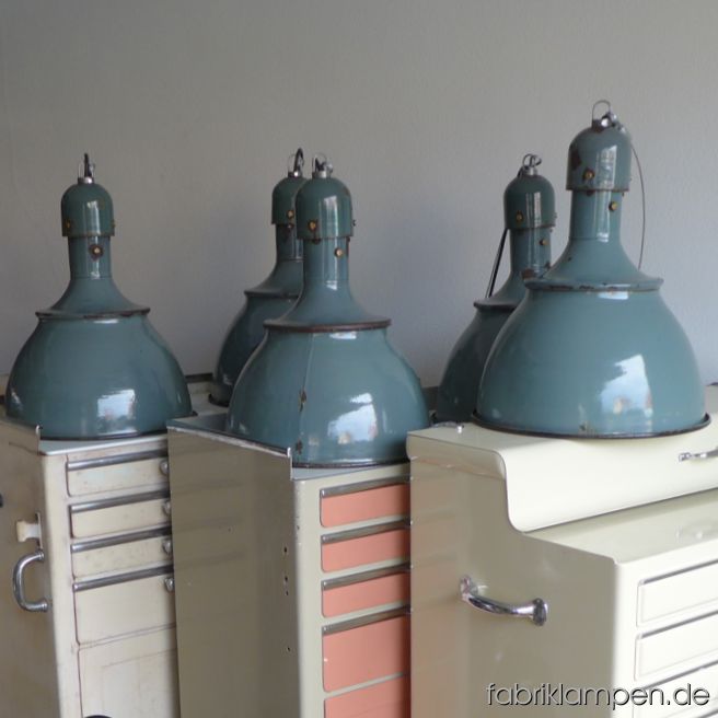 Some pictutes of the old green enamel lamps on old dentist cabinets.